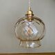 Suspension globe vintage en verre ambré