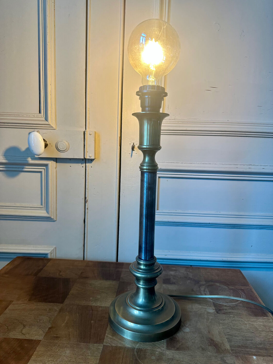 Lamp base in brass and chrome-plated steel