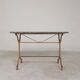 Bistro table marked A.Delail Toulouse in cast iron and marble, 1920