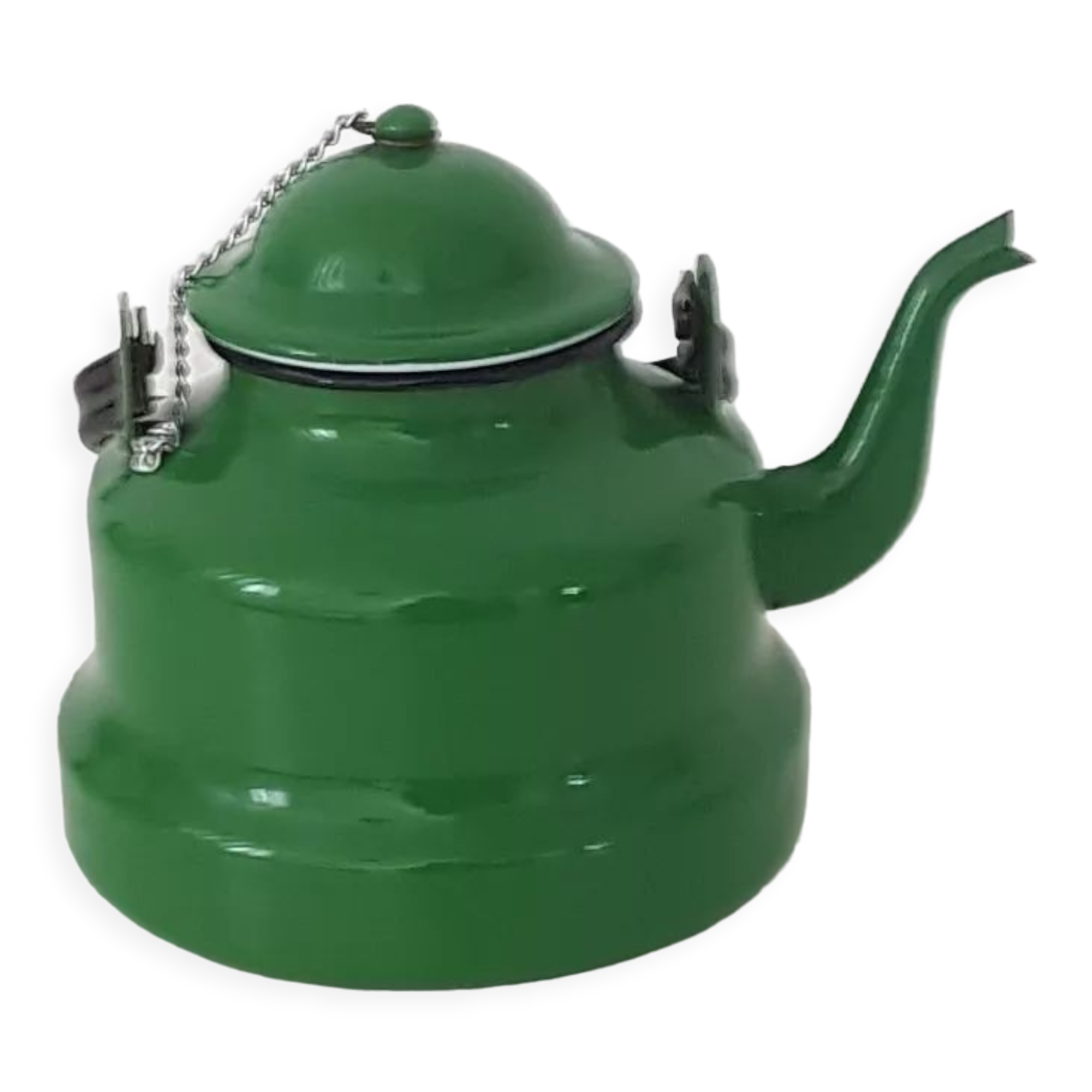 Old green kettle in enamelled metal