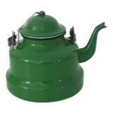 Old green kettle in enamelled metal