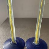 Duo of vintage Kosta Boda candlesticks in glass paste
