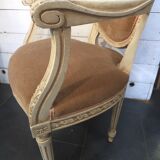 Louis XVI style bergère armchair in patinated wood