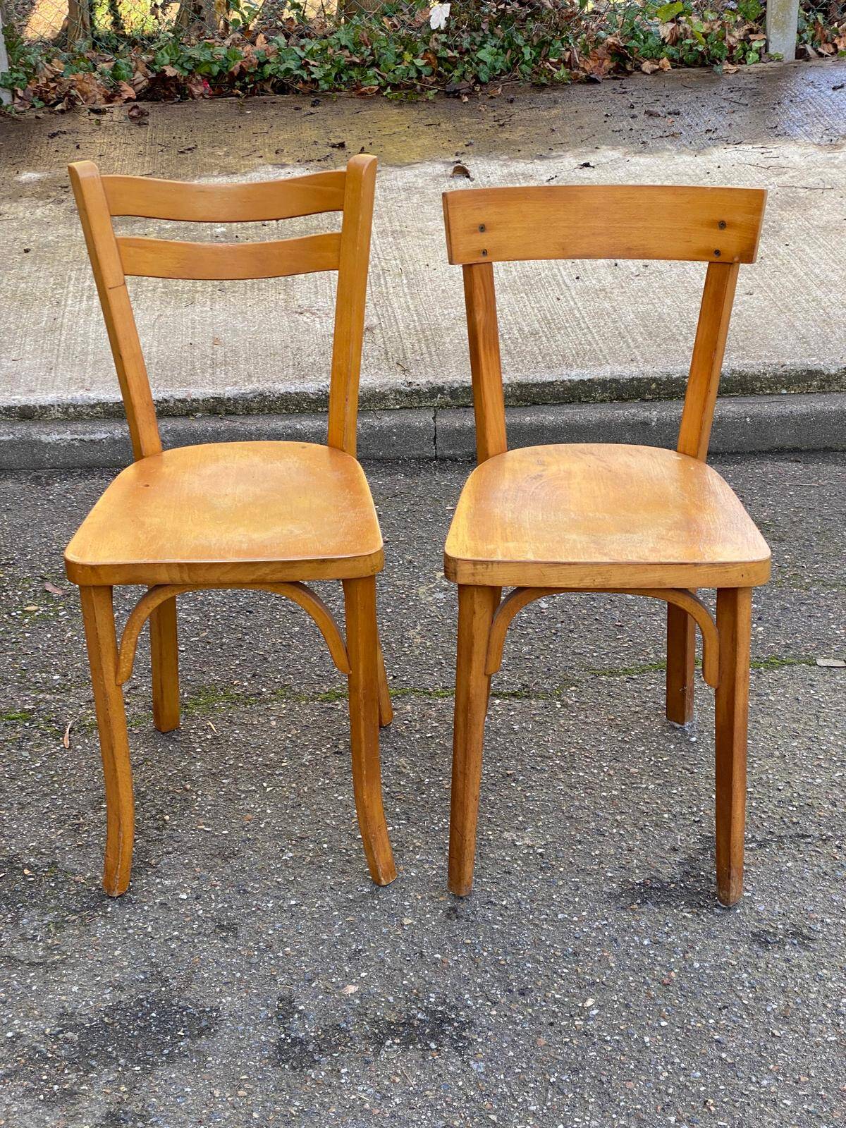 2 Scandinavian bistro chairs by Baumann in light wood from 1980.