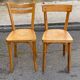 2 Scandinavian bistro chairs by Baumann in light wood from 1980.