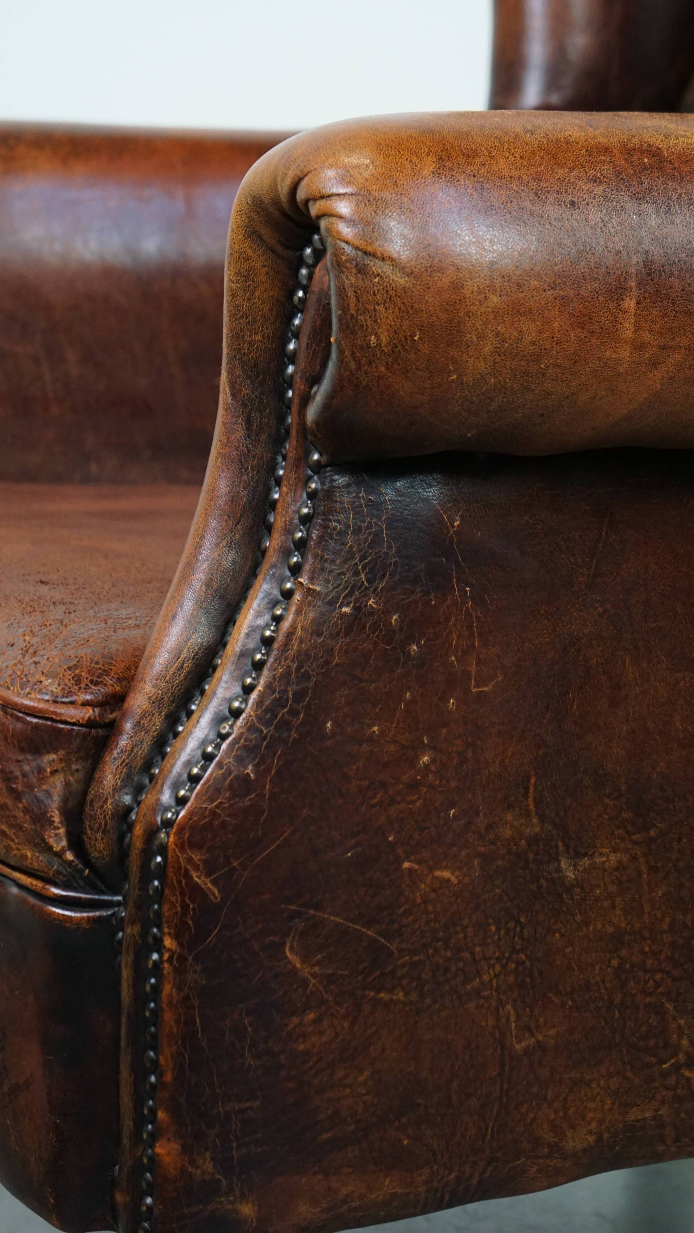 Vintage sheep leather wingback chair