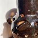 Brutalist lamp in black / brown ceramic openwork 1970