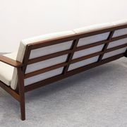 Three-seater modernist teak sofa, France circa 1950.