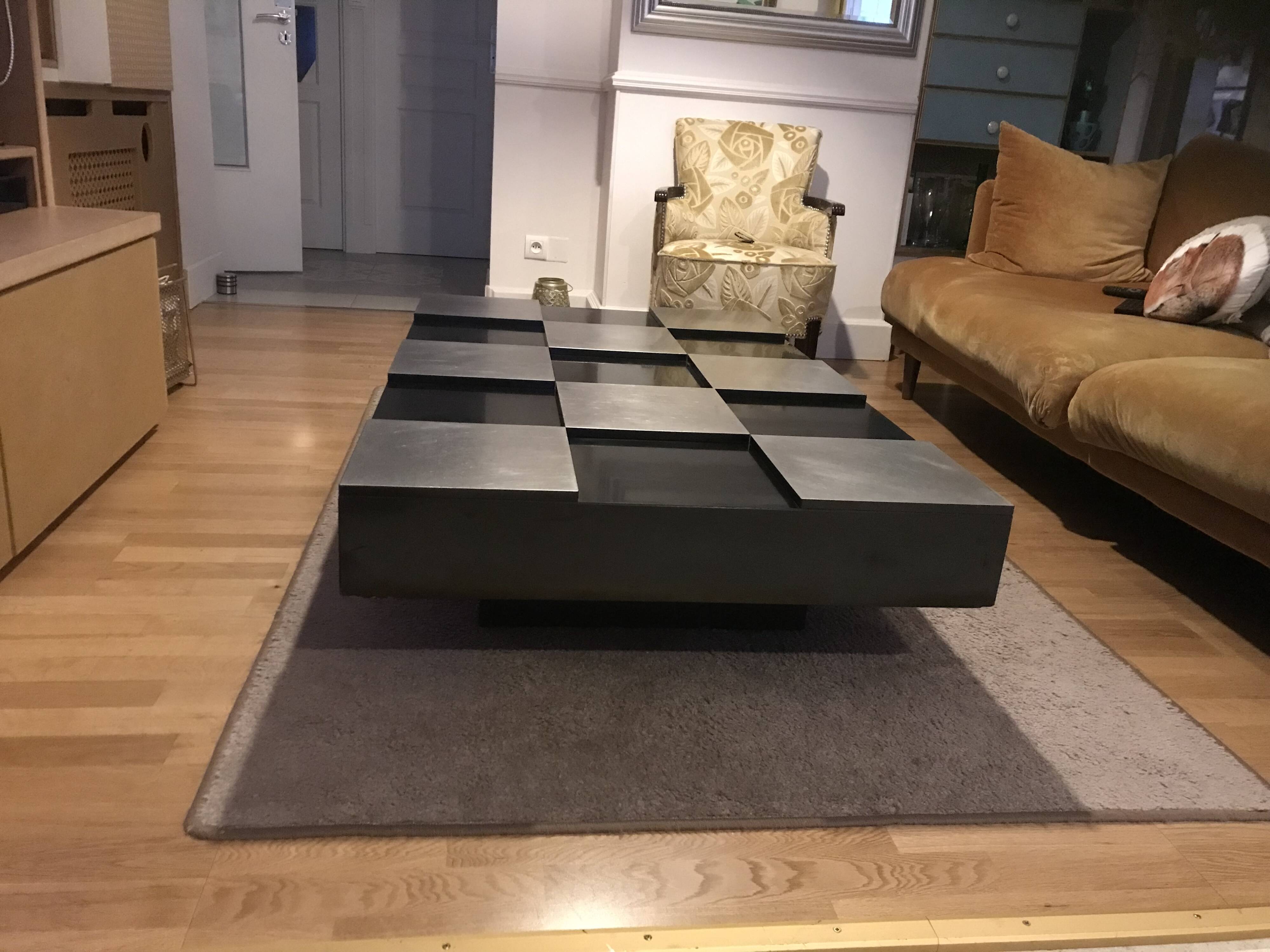 Coffee table with stainless steel checkered top and black formica