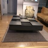 Coffee table with stainless steel checkered top and black formica