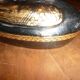 Black and gold wooden duck
