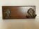 Wooden coat rack with two hooks
