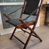 Colonial style folding leather and teak armchair