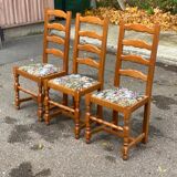 3 solid wood chairs with embroidered fabric