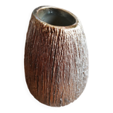 Small asymmetrical golden seed-shaped vase