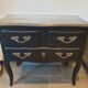 Stamped black Louis XV chest of drawers
