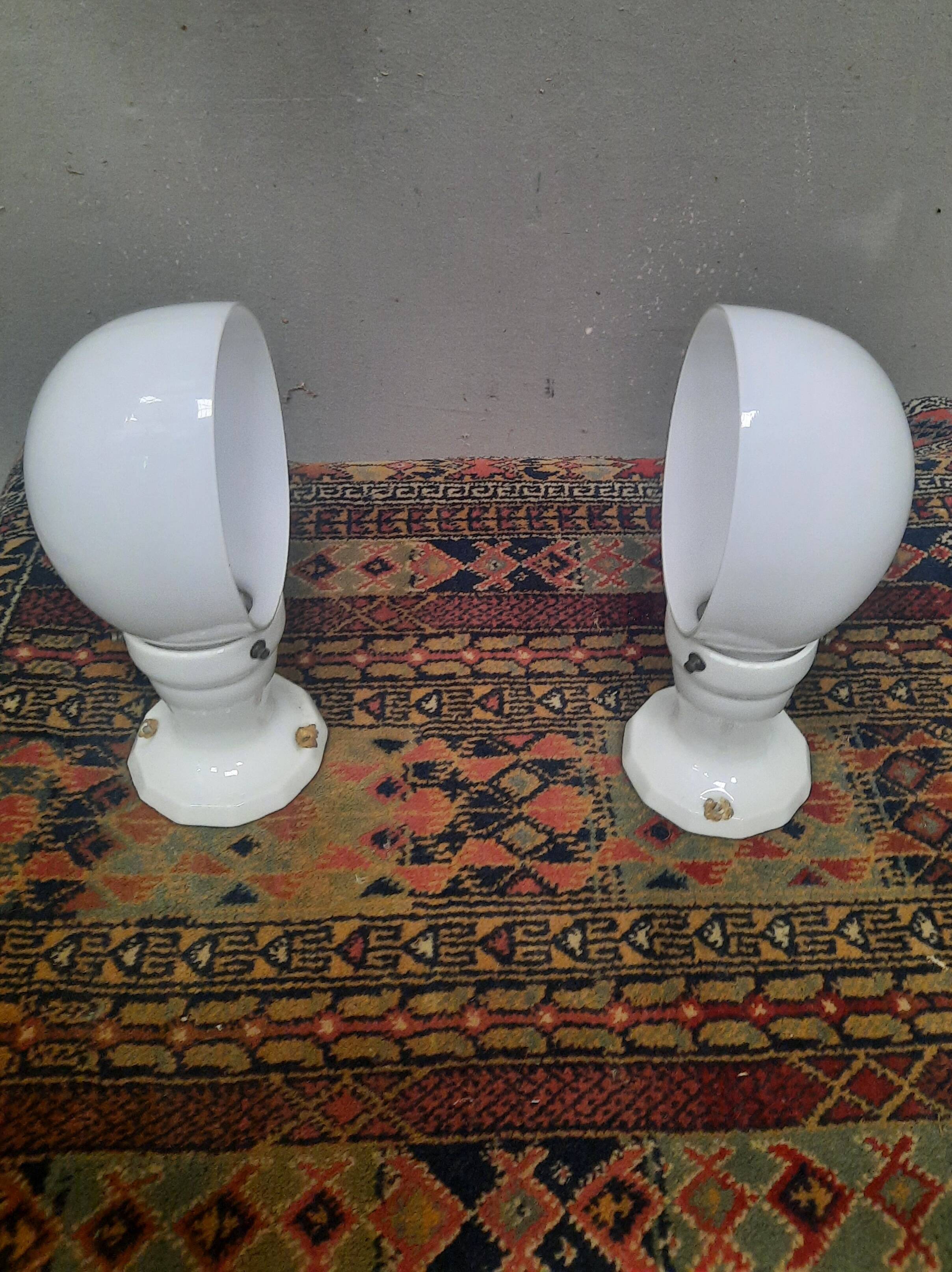 Pair of wall lights from the 1950s in porcelain.