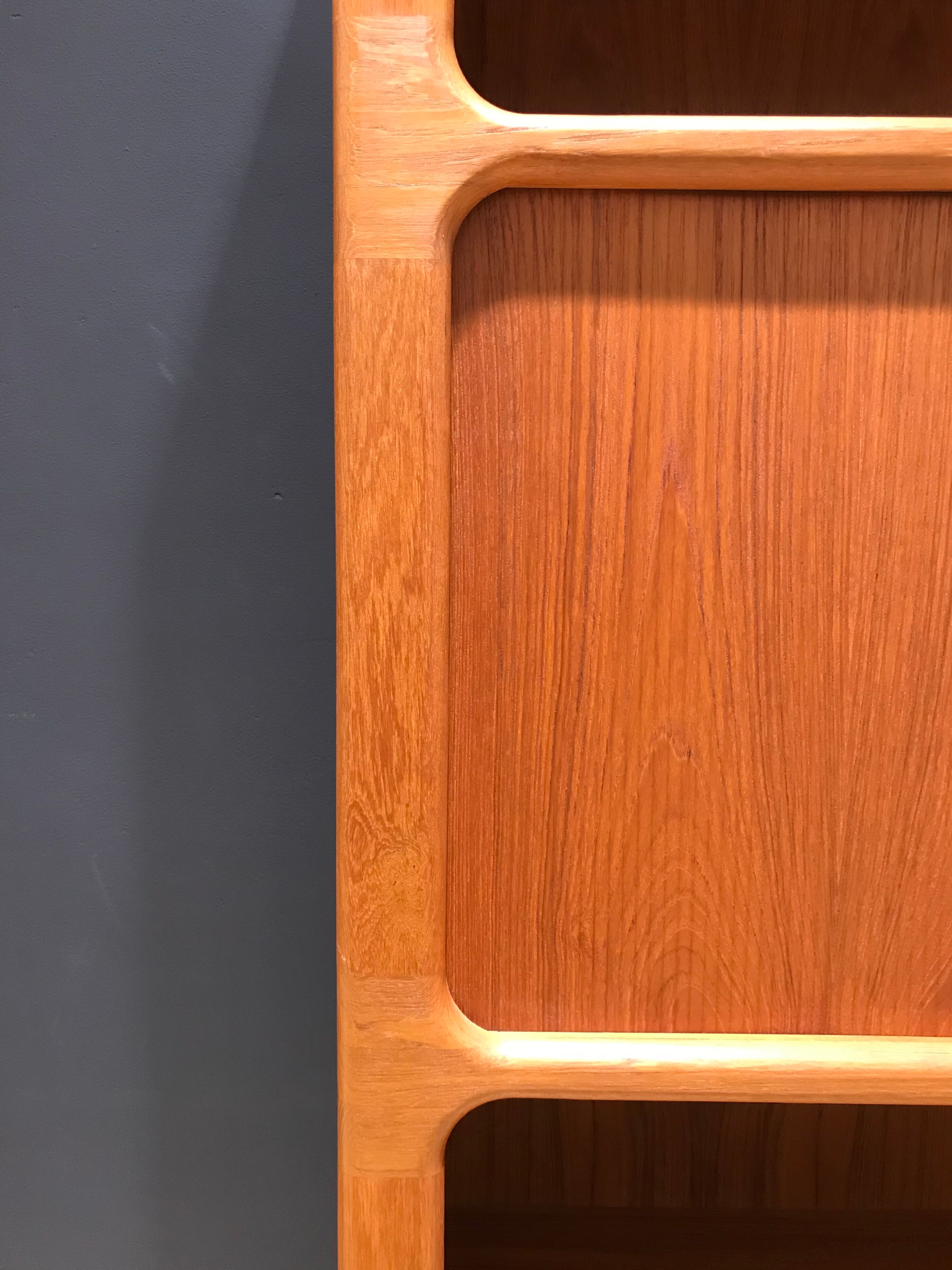 Teak wall system by Niels Bach for Dyrlund, 1970