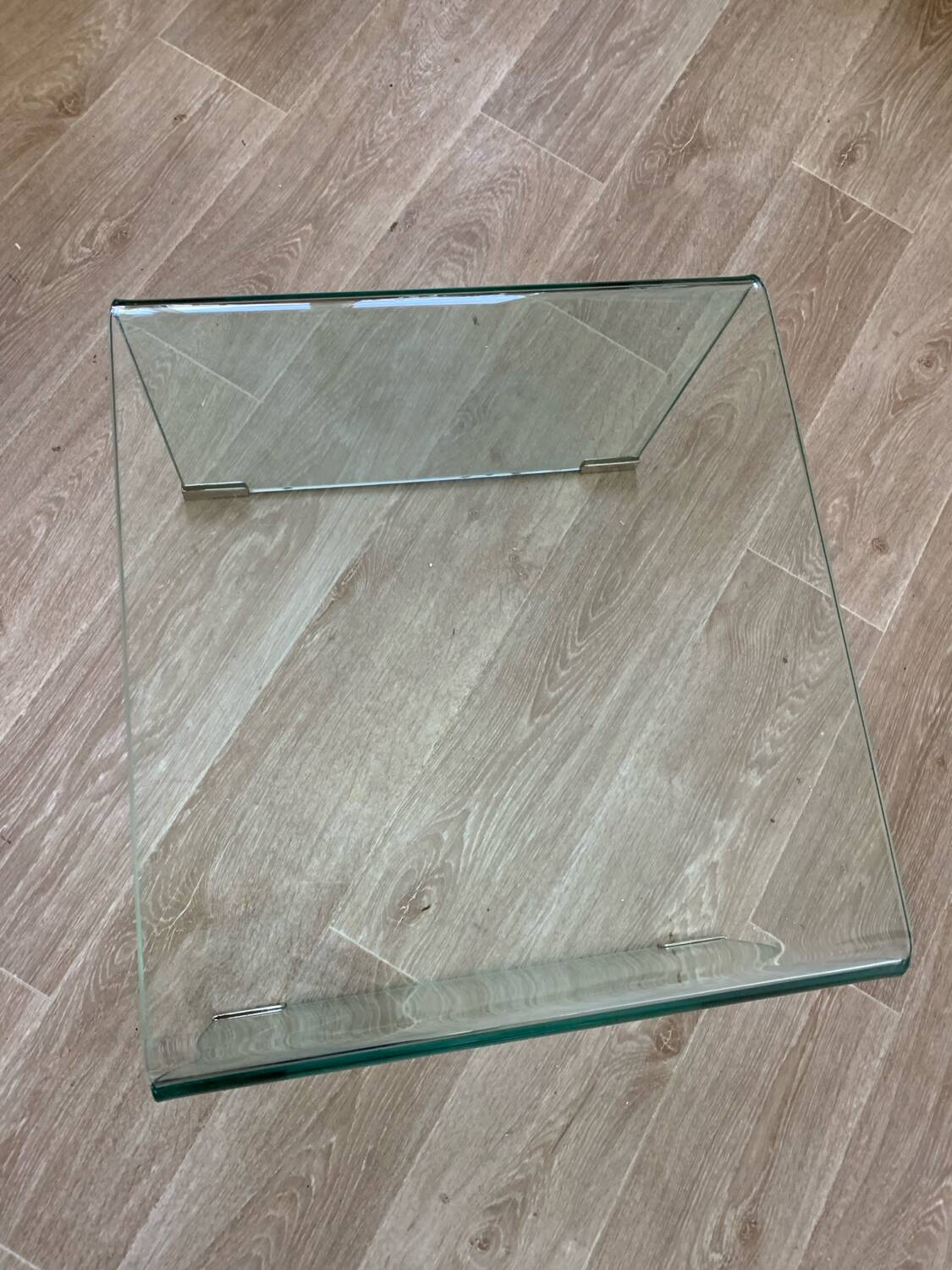 Curved glass coffee table
