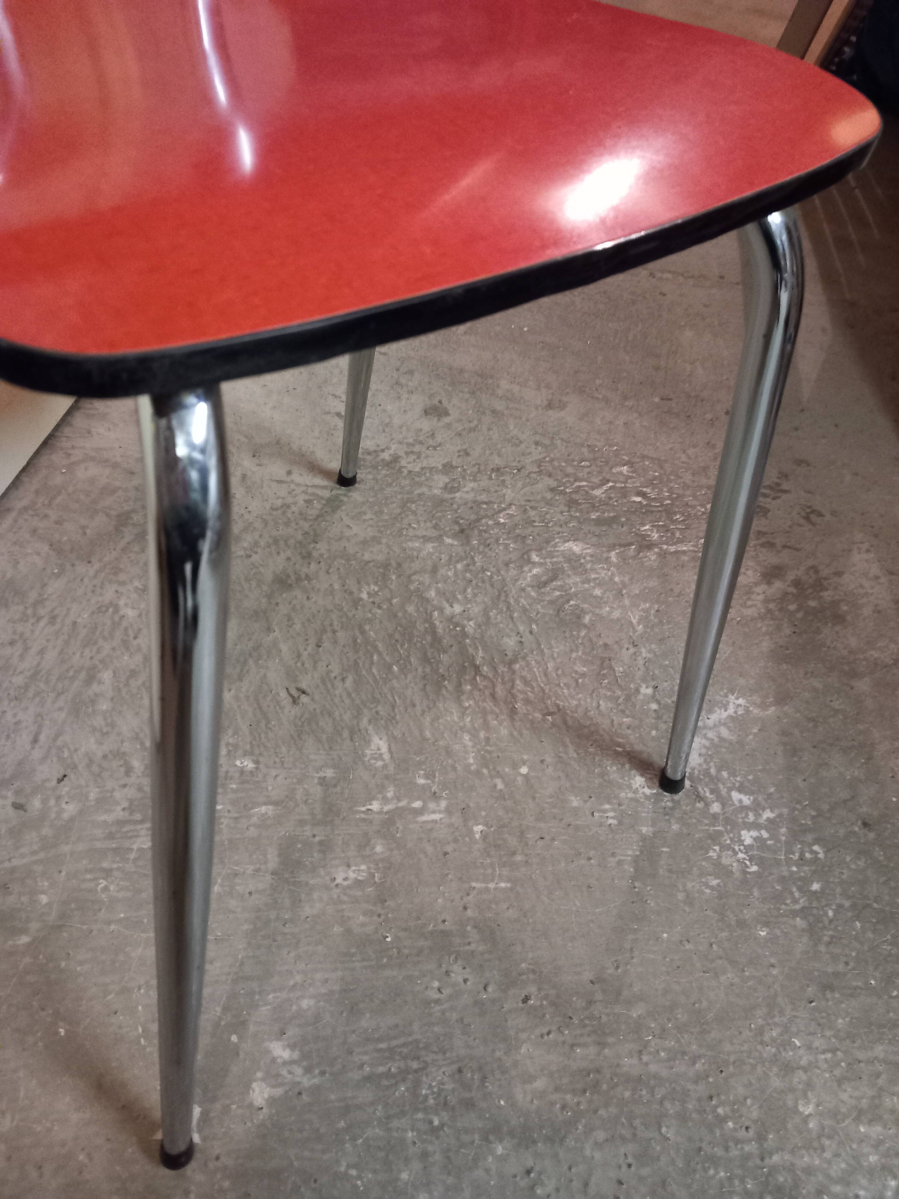 4 red formica chairs