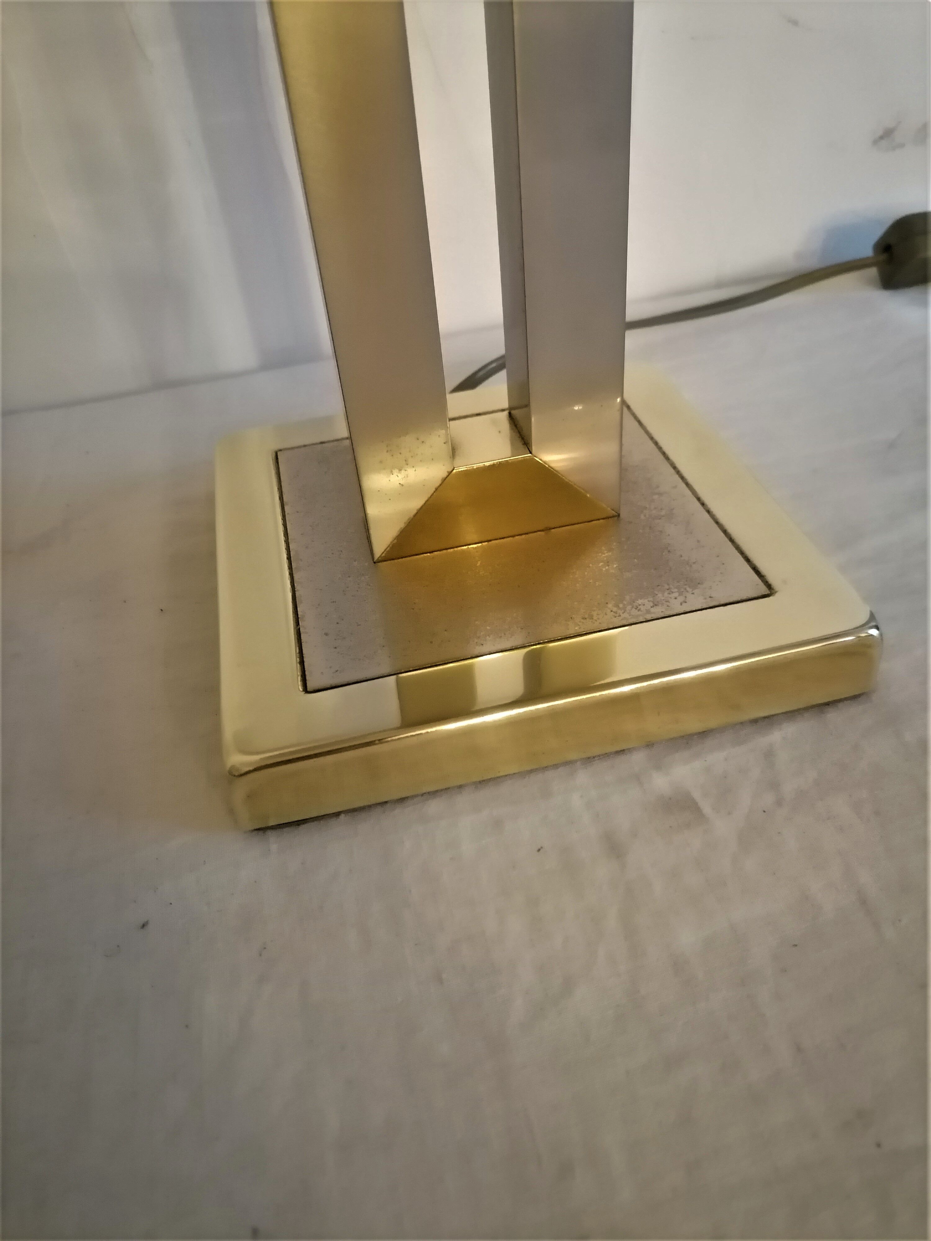 Modernist lamp. Brushed steel and brass.