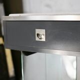 Modernist console, 1960s, glass base, wooden and fabric top.