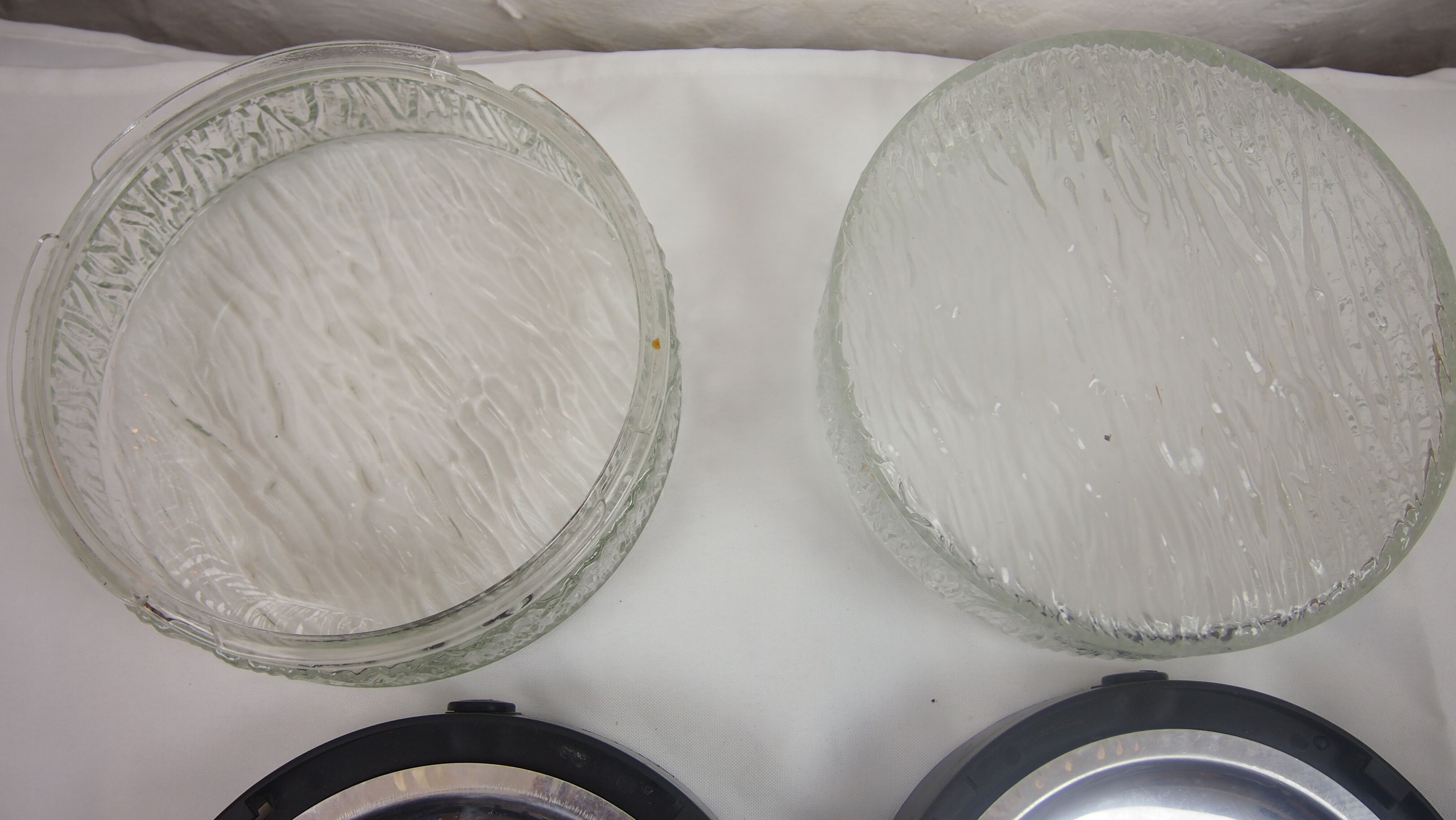 Pair of mapelec textured glass wall lights, 1970