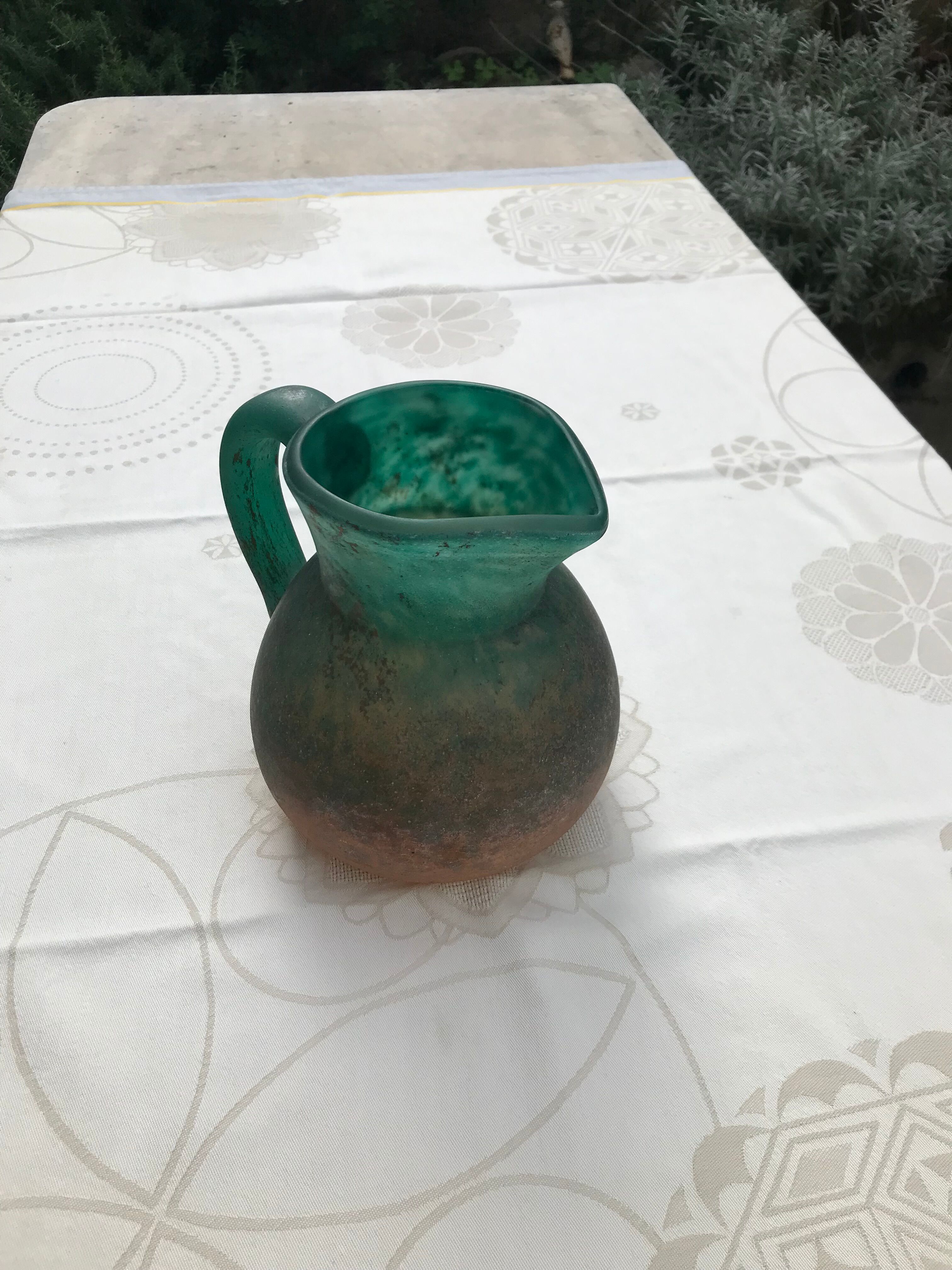 Orange and green glass paste pitcher by Georges DE FEURE