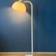 Vintage floor lamp in white metal with acrylic shade.