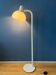 Vintage floor lamp in white metal with acrylic shade.