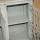 Vintage sideboard with wrought iron doors