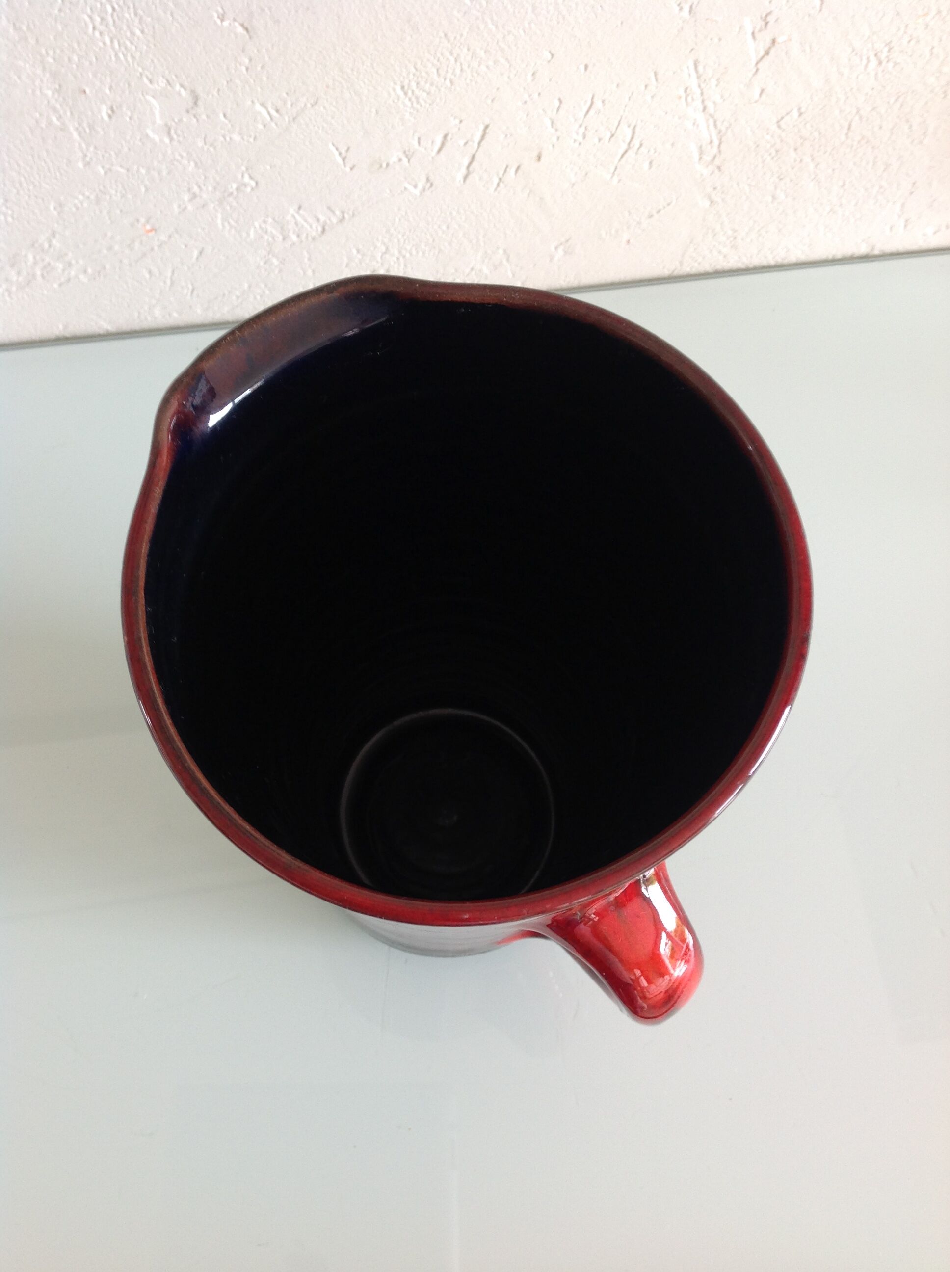 Pitcher in glazed red ceramic / vintag 60s-70s