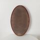 Vintage oval wooden mirror "caramel" from the 1960s.
