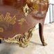 Commode de style Louis XV en laque rouge époque 1900