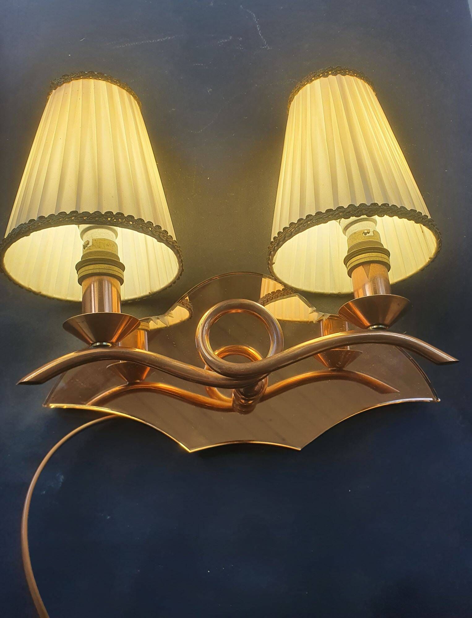 Copper wall lamp with 1940s Art Deco shades.