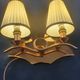 Copper wall lamp with 1940s Art Deco shades.