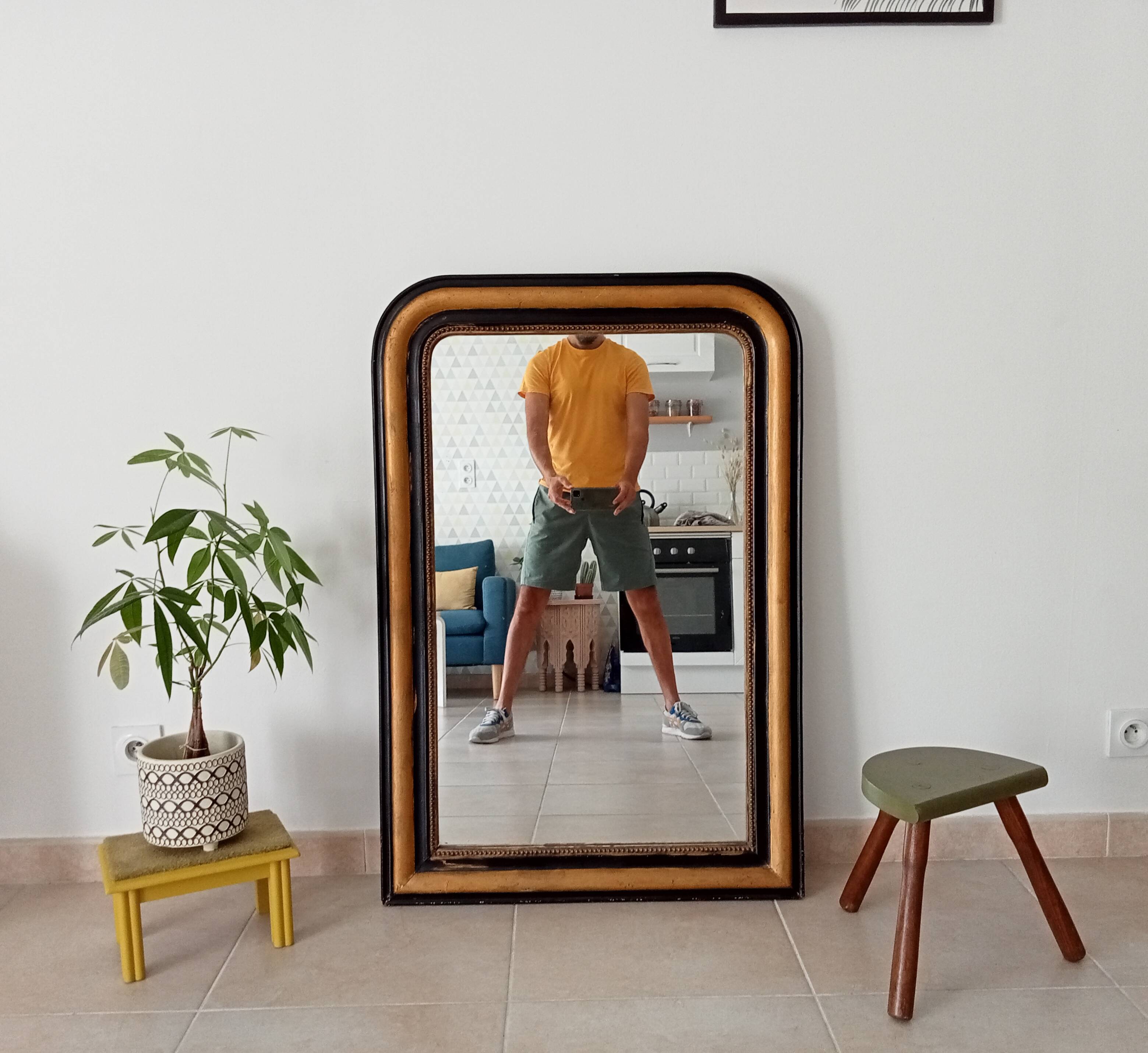 Louis Philippe mirror 105*71cm in wood and stucco 19th century