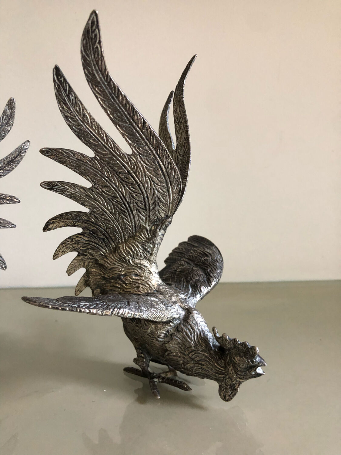 Vintage silver metal roosters