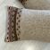 Pair of retro knitted wool cushions