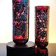 Paire de vases Laugharne avec revêtement en argent, en verre soufflé à la main de couleur rubis marbré.
