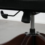 Adjustable black timeless Chesterfield office chair made of cow leather