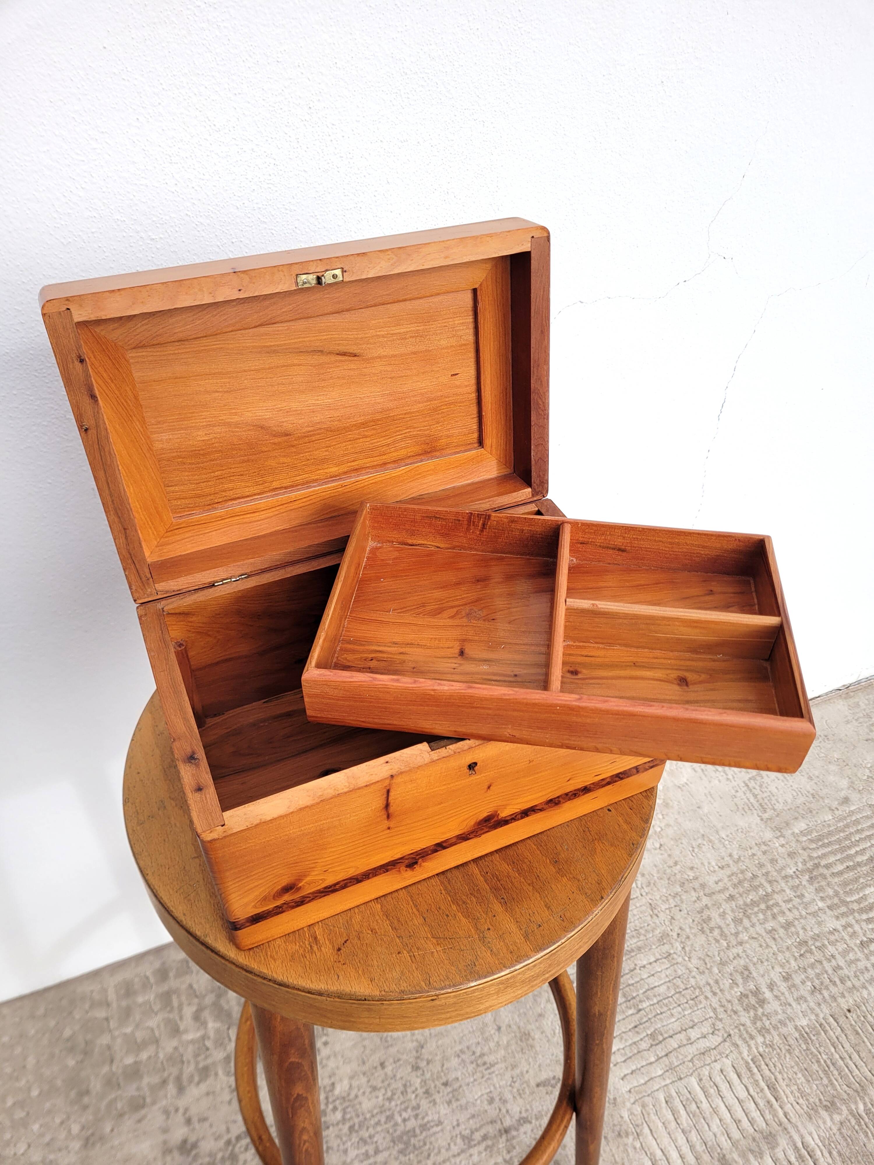 Old compartmentalized jewelry box