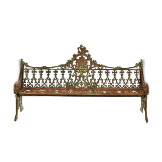 Sculpted cast iron bench with green patina circa 1940