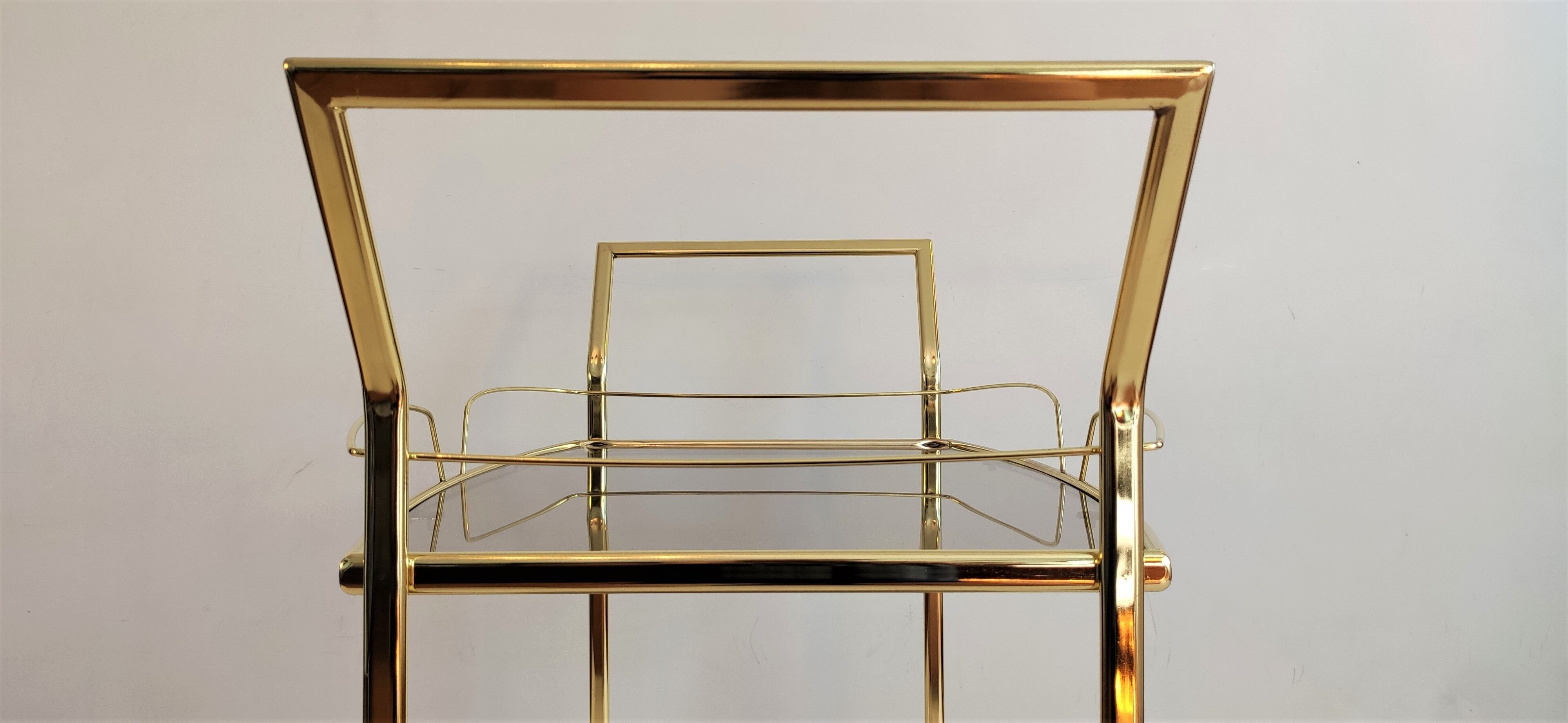 Serves golden trolley bar with wheels, in golden brass of the 80'S