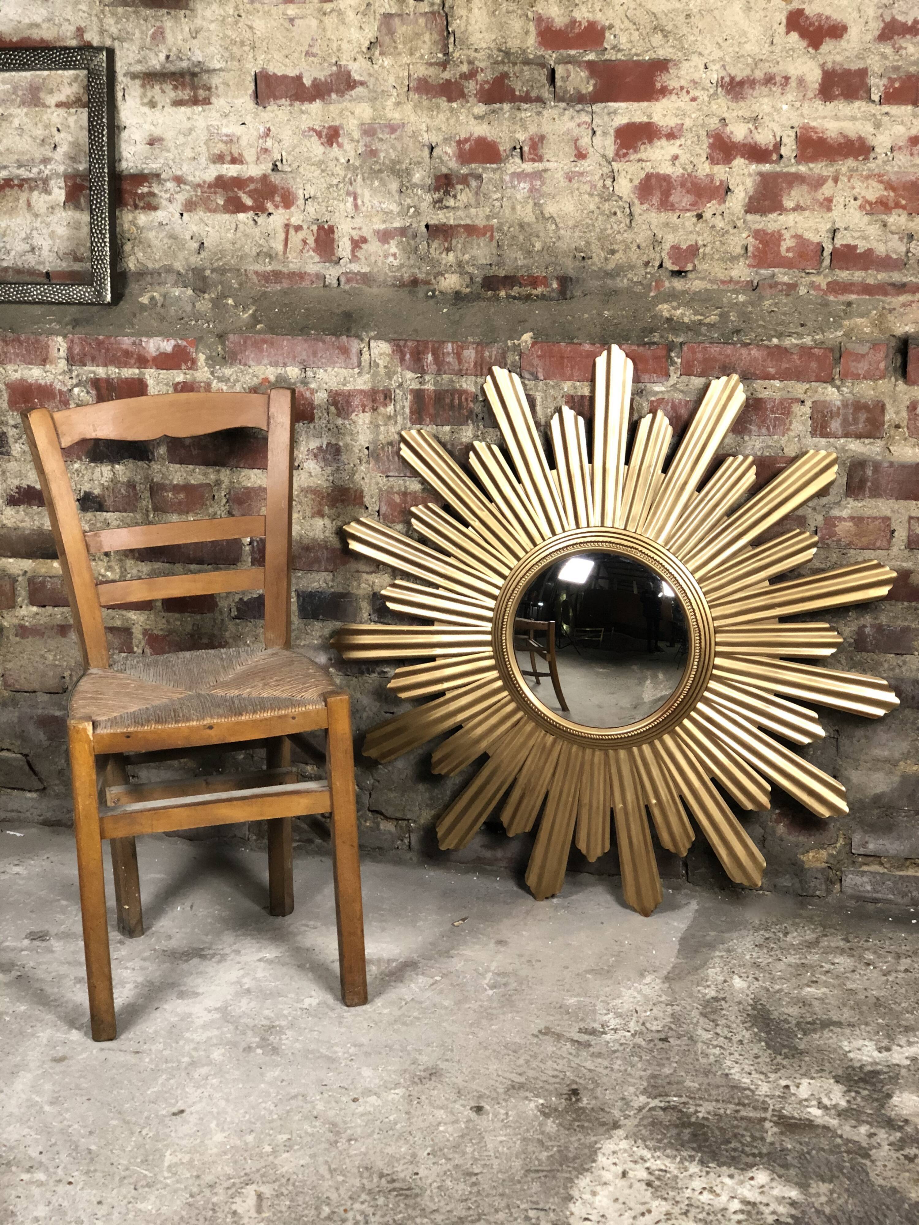 Sun mirror "André" in gilded sheet metal witch eye