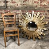 Sun mirror "André" in gilded sheet metal witch eye