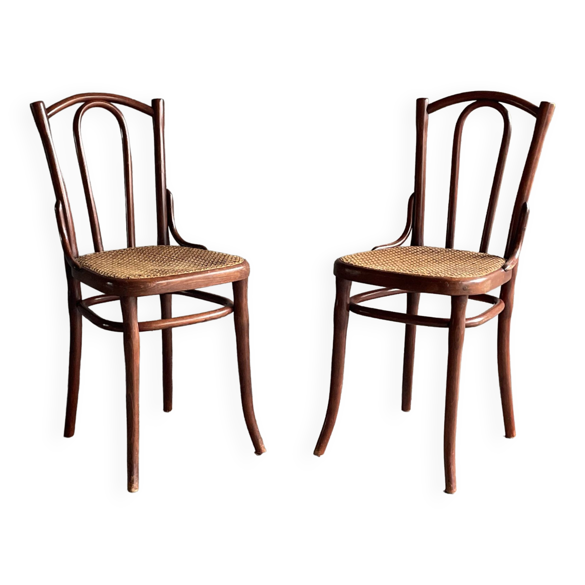 Pair of caned bistro chairs by Thonet