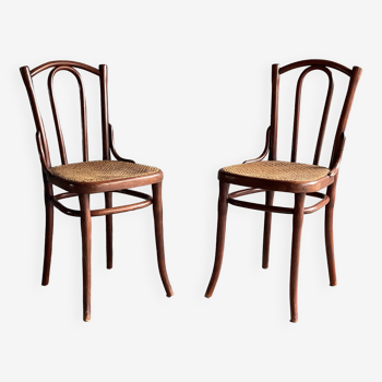 Pair of caned bistro chairs by Thonet