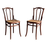 Pair of caned bistro chairs by Thonet