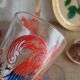Pitcher and 6 vintage peacock liqueur glasses